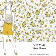 VF223-49 Vista Florets - Tiny Yellow Flowers Printed on a Lightweight Textured Poly Knit Fabric